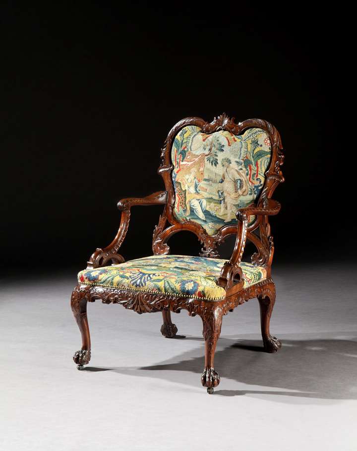 A rare George II period carved mahogany armchair